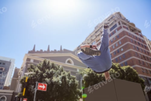 Preview: Man doing free-running in the city on a sunny day