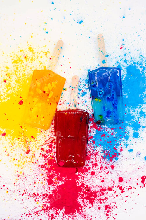Preview: Colored Popsicles Against Multicolores Explosion Paint.