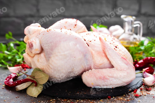 Preview: Raw chicken. Fresh whole chicken with ingredients for cooking