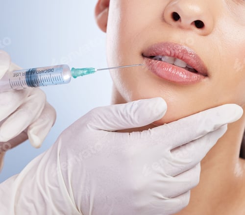 Preview: Lips, botox and plastic surgery with hands on the face of a woman for cosmetic surgery in studio on
