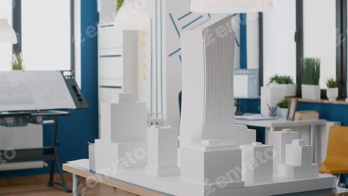 Preview: Empty architectural office with building model and maquette on table