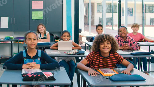 Preview: Portrait Of Smiling High School Class Using Digital Tablets In Class