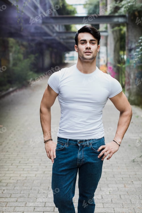 Preview: Portrait of handsome young man outdoors