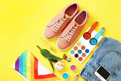 Preview: Flat lay composition with clothes and accessories on color background. Trendy spring look