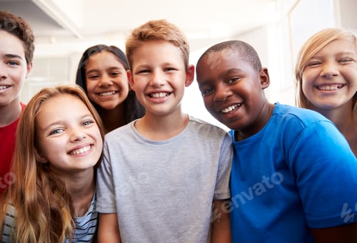 Preview: Portrait Of Smiling Male And Female Students In Grade School Classroom