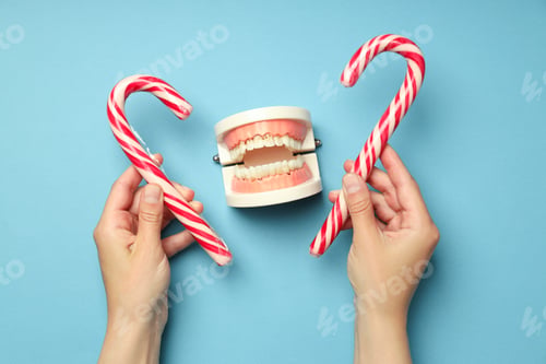 Preview: Concept of food bad for teeth on blue background