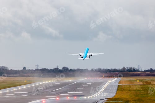 Preview: Airplane departing airport runway on cloudy day