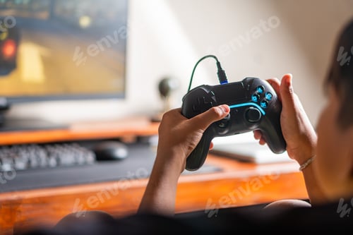 Preview: Hands Holding Gaming Controller