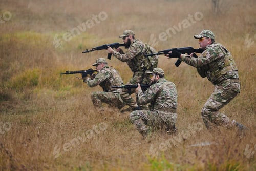 Preview: A disciplined and specialized military unit, donned in camouflage, strategically patrolling and