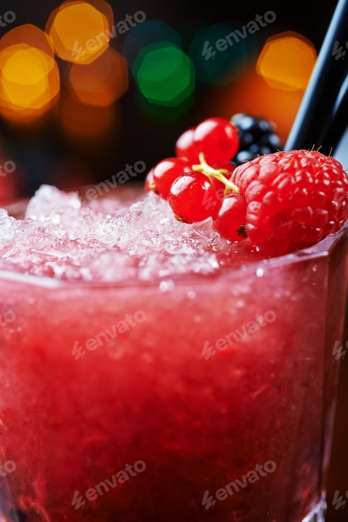 Preview: beautiful and tasty berries cocktail or lemonade with a nice bokeh. soft focus.