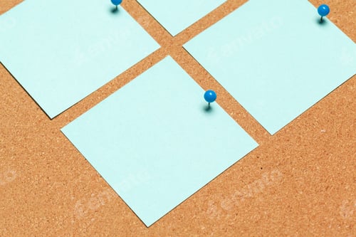 Preview: Sticky note pinned on cork board with thumbtacks