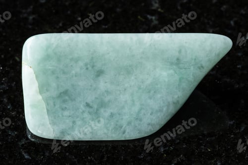 Preview: sample of polished jadeite mineral on black