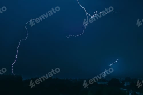 Preview: Lightning in sky over city.