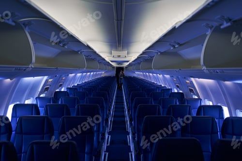 Preview: Stewardess looking at herself in the compact mirror aboard the aircraft