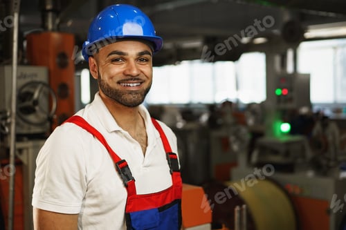 Preview: Portrait of a smiling handsome african american factory worker