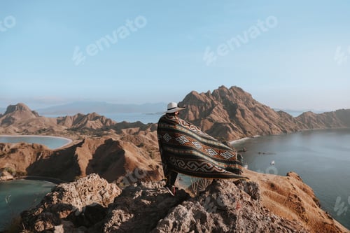Preview: Girl with ethnic clothes on top hill