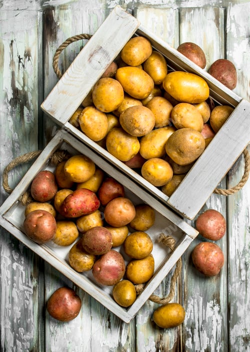 Preview: Potatoes on tray and in box.