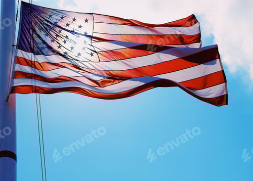 Preview: American Flag Waving Against a Clear Blue Sky