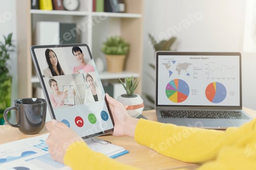 Preview: Businesspeople virtual video conference meeting plan analysis graph company finance statistics