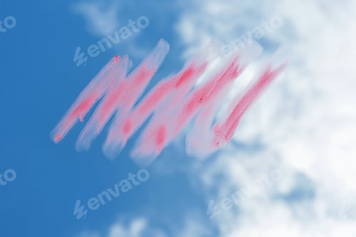 Preview: Red smear of lipstick against the background of the sky and clouds close-up.