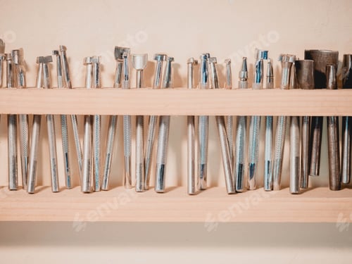 Preview: Carving stamps set tool on the shelf. Leather craft instruments for processing of natural materials