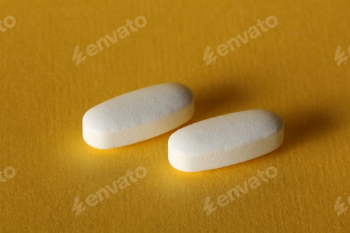 Preview: Tablets On A Yellow Background Close-Up