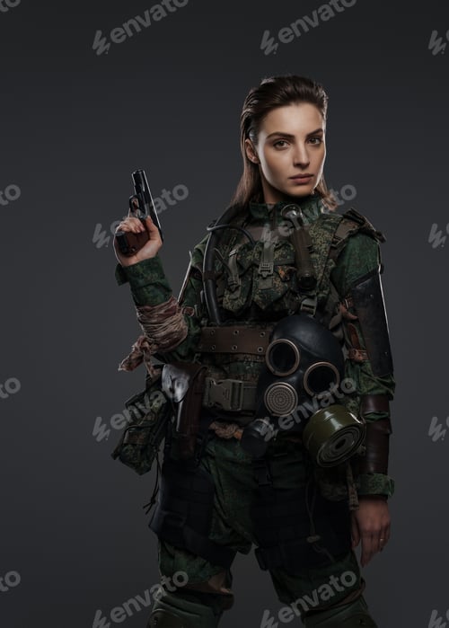 Preview: Female warrior dressed in military garb, armed with a pistol
