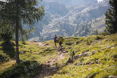 Preview: Trekkers hiking in the Dolomite Mountains in Italy.