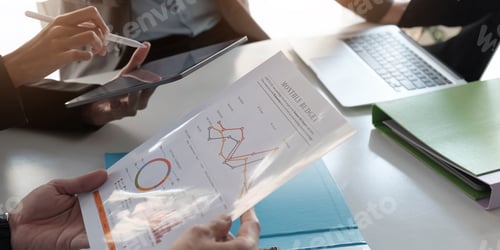 Preview: Asian business adviser meeting to analyze and discuss the situation on the financial report in the