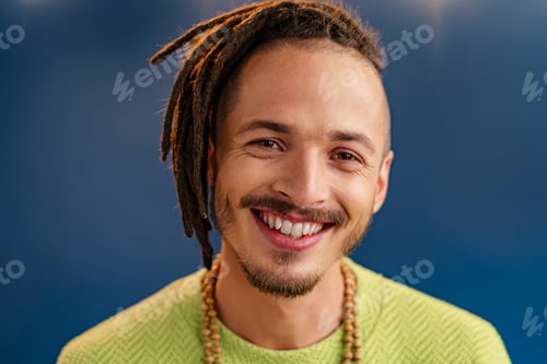 Preview: Portrait of a happy positive guy with dreadlocks