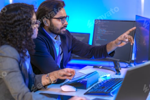 Preview: A data science team collaborates, analyzing a neural network model and code