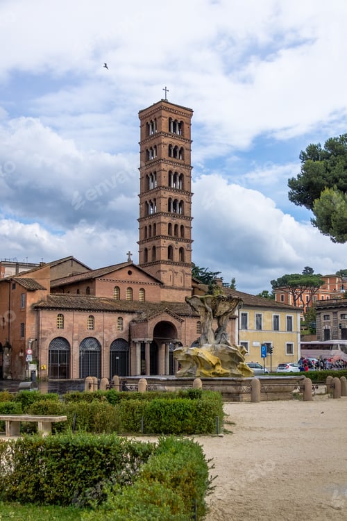 Preview: Tritons fountain and Basilica of Saint Mary in Cosmedin at Piazza Bocca della Verita - Rome, Italy