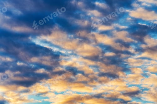 Preview: Amazing Clouds in Blue Sky, Illuminated by Rays of Sun at Sunset to Change Summer Weather