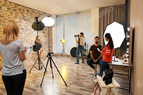 Preview: Photo studio with professional equipment and team of workers