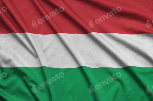 Preview: Hungary flag is depicted on a sports cloth fabric with many folds. Sport team waving banner