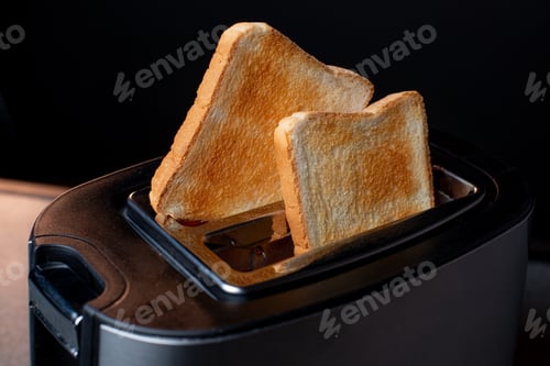 Preview: Modern toaster with crispy bread slices, closeup