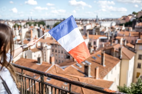 Preview: Woman with french flag in Lyon