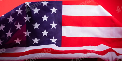 Preview: American stars and stripes flag on podium on red background