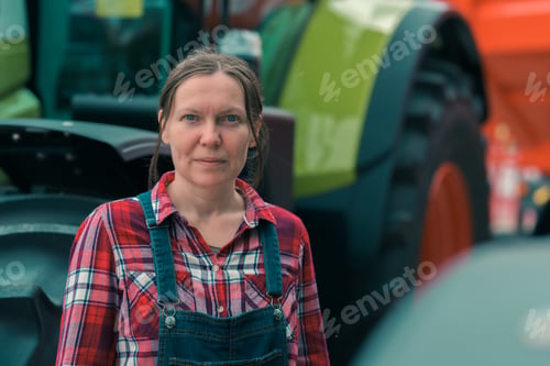 Preview: Female farmer and agricultural tractor