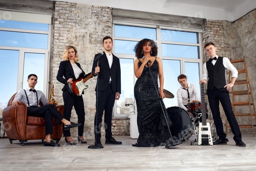 Preview: Young international musicians, a band performing on the loft stage. The concept of music, hobby