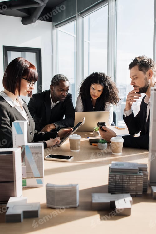Preview: Business Meeting With Architectural Models
