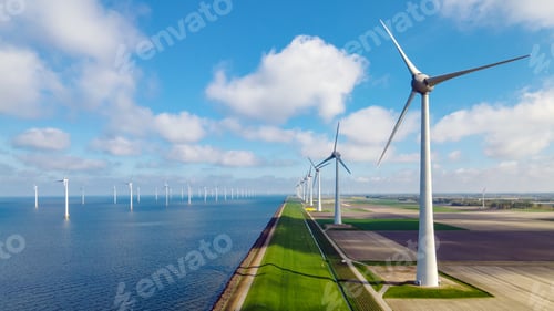 Preview: offshore windmill park with clouds and a blue sky