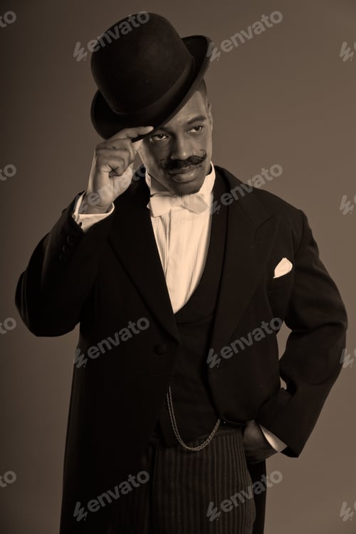 Preview: Retro Afro American 1900 Style Man With Mustache. Wearing Black Hat. Taking Off His Hat.