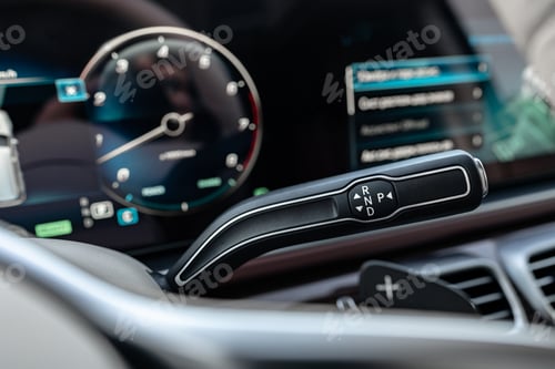 Preview: Modern luxury car interior with steering wheel, multimedia and dashboard