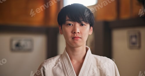 Preview: Japanese man, student and portrait for martial arts practice or traditional sport, fighting and hea