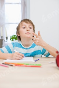 Preview: Boy doing his homework