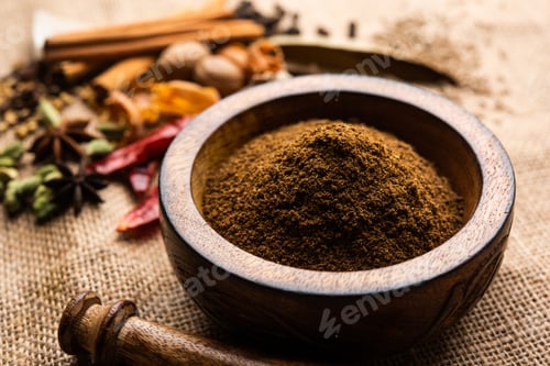 Preview: Indian Garam masala powder and colourful spices. selective focus