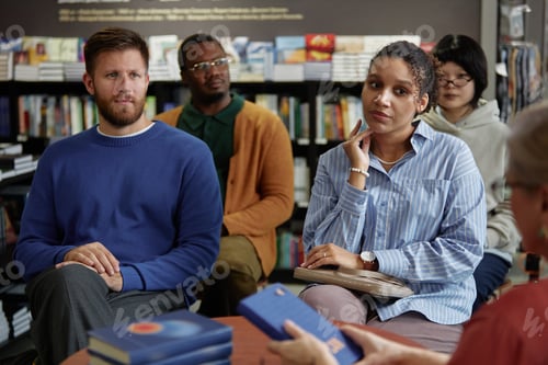 Preview: Diverse Group of Young Adults and Middle Aged People Attending Session with Book Author