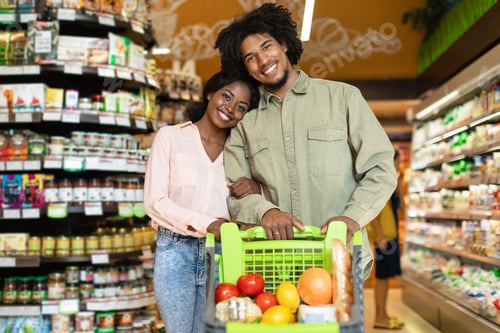 Preview: Black Couple On Grocery Shopping Posing With Shop Cart Indoor