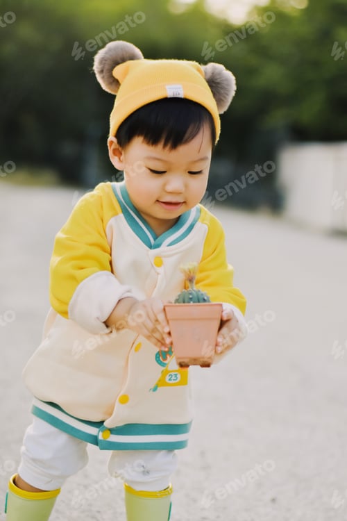 Preview: Little boy and cactus